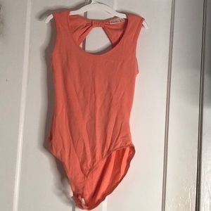 Peach body suit